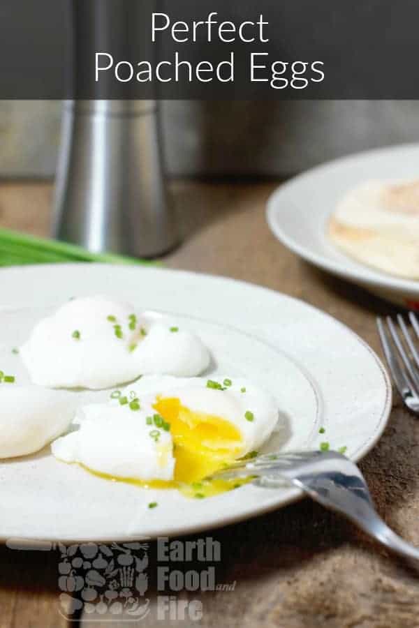 perfectly poached eggs cut open and garnished with chives