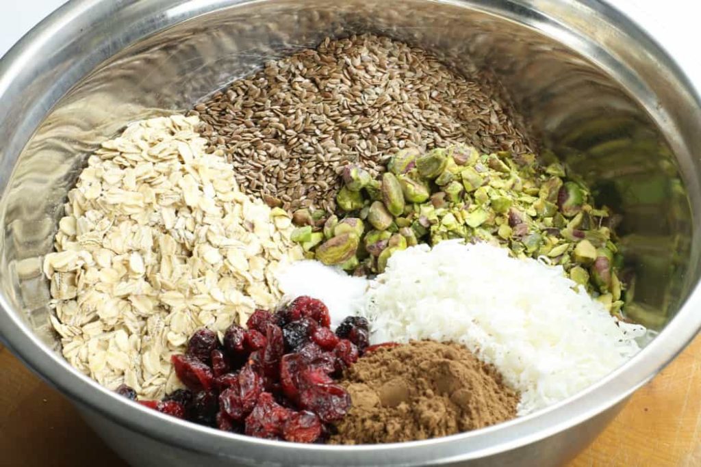 A simple mix of ingredients in a bowl for making homemade granola bars.