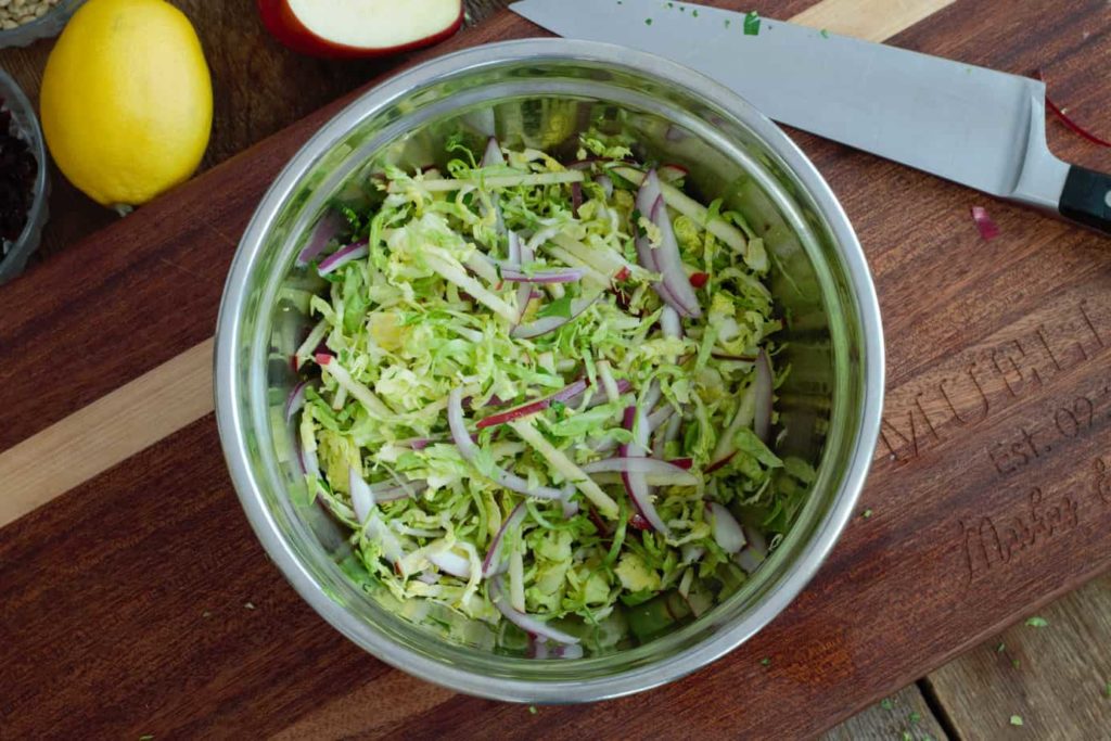 raw shredded veggies in a steel bowl